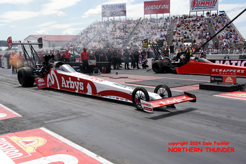 Clay Millican (near lane) vs Jasmine Salinas (far lane)